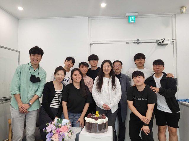 Teachers' Day, with a cake for the lab's fifth year