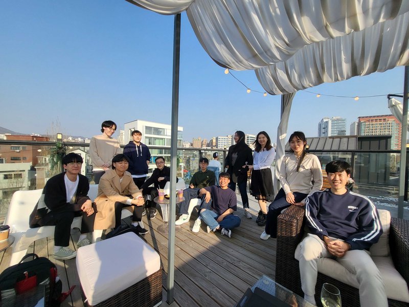 Lab gathering on a rooftop terrace